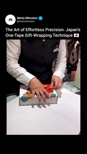 Meta Minutes on Instagram: "This Japanese gift-wrapping technique transforms a single piece of tape into a flawlessly sealed package through precision, geometry, and practiced muscle memory. Instead of relying on layers of adhesive, it uses carefully measured folds and paper tension to secure the wrap. Each crease is intentional—redistributing pressure, creating friction, and locking the structure in place. The result is a clean, durable wrap that holds together elegantly without excess material