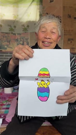 Guess, children, is Grandma drawing a dinosaur egg or a duck egg?
