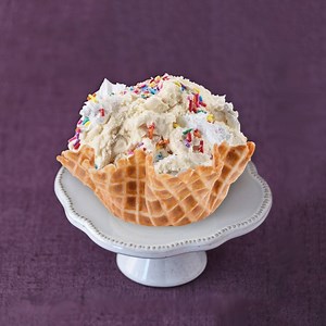 Cookie Dough has never tasted so sweet! The new Somewhere Over the Rain-dough™ Creation™ features Classic Cookie Dough Ice Cream, Frosting, Rainbow Sprinkles and Sugar Crystals! | Cold Stone Creamery