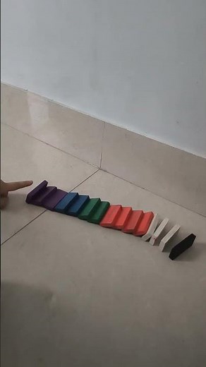 Dominoes Falling in Slow Motion | Mesmerizing Chain Reaction