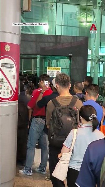 Tens of thousands stranded at Malaysia immigration checkpoints after 5-hour system crash