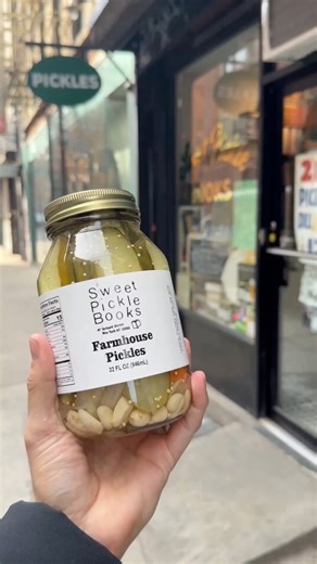 Sweet Pickle Books lets you trade in books for pickles! 📚🥒 The NYC bookstore on the lower east side will give you a JAR of pickles if you trade in 5 books. The cozy shop is the only place in the world where you can use books as currency for pickles! 💚 #pickles #nyc #books | Foodbeast