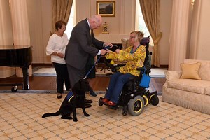 1K views · 104 reactions | Assistance Dogs Australia patron the Governor-General, His Excellency General the Honourable Sir Peter Cosgrove AK MC (Retd) and Lady Cosgrove, presented Assistance Dog Cosgrove (Cossie) to client, Ms Sarah Jane Staszak at Government House Canberra. | Assistance Dogs Australia | Facebook