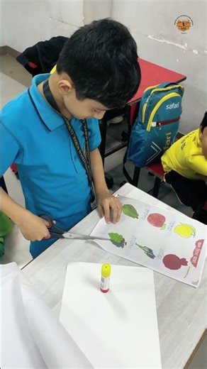 Teaching the little ones the sweet sounds of Assamese fruits.