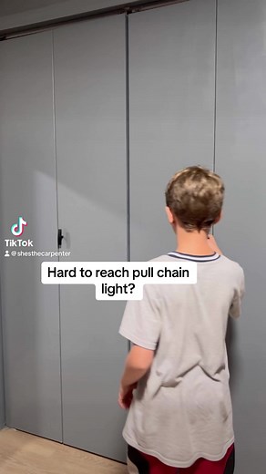 I love this simple solution for our pull chain lights! It’d be great for a lamp too! #amazonfinds2023 #closetorganization #homeimprovement | She’s the Carpenter