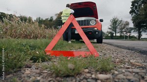 Vehicle Breakdown. Driver Having Problem On Road And Calls For Help. Woman Calling Help Assistance Towing Car