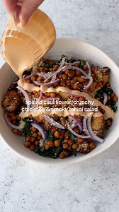 Smoky tahini salad👇🏼😍 Spiced cauliflower, crunchy chickpeas, couscous, lemon kale, red onion and sesame with a creamy smoky tahini dressing. Wholesome and delicious! If you haven’t checked out my previous nourish bowl recipes, save this video for later and go watch! Don’t forget to follow @tessbegg for more recipes🌿 Serves 2 Cauliflower and chickpeas: 1 head of cauliflower, cut into small florets (roughly 3 cups) 420g can chickpeas, drained, rinsed and pat dry Drizzle of olive oil to coat it