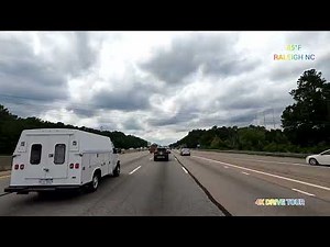 DRIVING ON INTERSTATE 40 WEST BOUND NEAR RALEIGH NC ON A SUMMER DAY