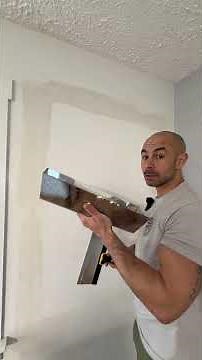 How to fix drywall paper that’s been peeled or torn. #construction #diy #carpentry #remodeling