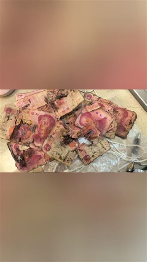 5万元现金被泡烂 银行职员3小时"抢救"出4.99万