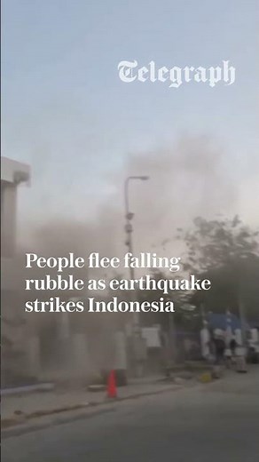 People flee falling rubble as earthquake strikes Indonesia