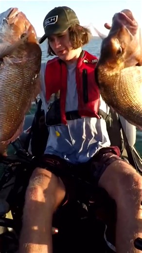 Exciting Kayak Fishing Encounter with Three Giant Fish Caught in One Net!