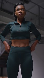 Vertical Video Of Determined Female Athlete Wearing Tracksuit Training In Gym Stretching And Warming Up Preparing For Sports Event | Free Stock Video Footage