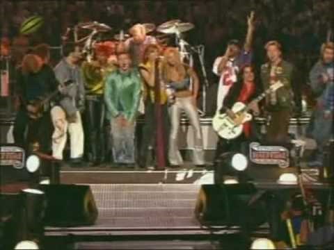 Britney Spears and Justin Timberlake singing "Walk This Way"