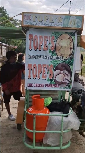 The pandesal (bread) man visits the barangay