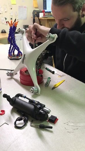 Gary at work on an Installation of Drone Parachute and Flight Termination System on a DJI Phantom 4 Pro- a tricky piece of engineering🤞We are the Only Authorised Installer of Dronavia Parachute Products in Ireland #southdublincountycouncil #droneparachute#dronesafety#drone#aerial #dronerepair #dji #djidrone #dublincoco #parachute