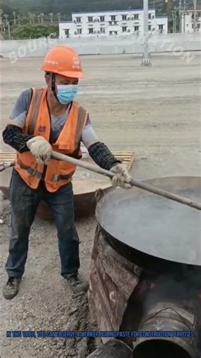 Construction Paste Boiling: Worker Prepares Adhesive for Building Projects