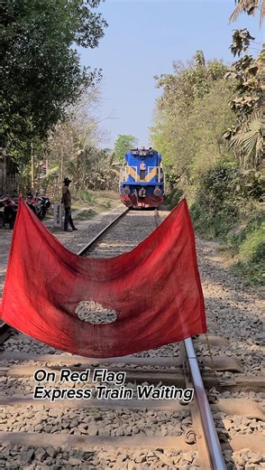 Express train waiting on the line under red flag protection. #reels #railway #trains #railroad #foryoupageシ | Saidur Rahman