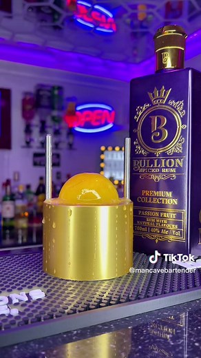 Refreshing Bullion Passion Fruit Rum With Orange Juice Ice Ball