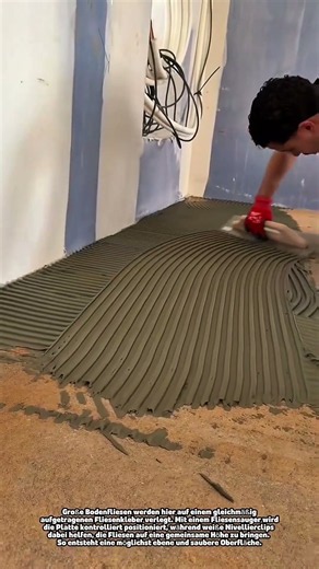 Professionelles Verlegen großer Bodenfliesen mit Nivelliersystem