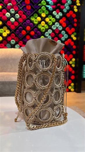 Cómo hacer una mochila de aros sin cortar hilo