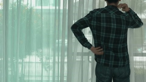 clip-3971218219-closeup-massaging-back-suffering-acute-pain-arthritis