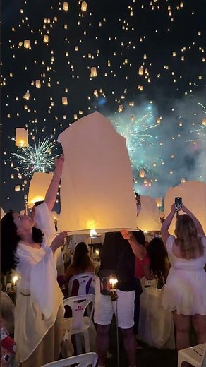 Sky Lanterns Rise into the Sky During Yipeng Festival in Chiang Mai