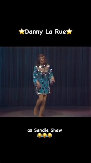 Paul Robinson on Instagram: "Another clip of the brilliant Danny La Rue from his amazing set on the 1969 @royalvarietyperformance This time as Eurovision winner @sandieshawofficial ….genius!😂👏🏼⭐️❤️ #femaleimpersonator #variety #showbizlegend #drag #star #reels #instareels #reelsoftheday #reelsinstagram #instagram #reelsofinstagram #comedy #comedian #comedygold #comedyreels"