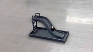 A Clever Optical Illusion Showing a Ball Rolling Uphill