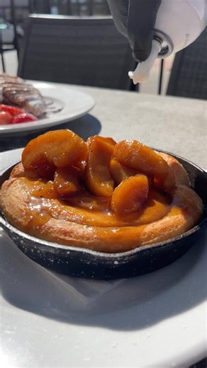 Whipped cream is the perfect finishing touch on our Bourbon Apple Cinnamon Rolls. Sweet, cozy, and only here for a limited time at Wild Eggs 🍁 | Wild Eggs Restaurants