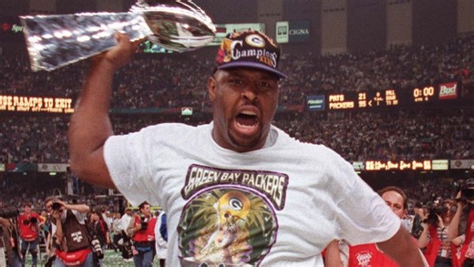 Who was Reggie White and why was he so important to the Green Bay Packers?