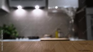 Wooden table top on blur kitchen room background. For displaying the assembly product or visual arrangement of the configuration keys