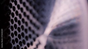 Metal net circle texture background. Abstract holes in the metal macro. Round holes centrifuge close-up
