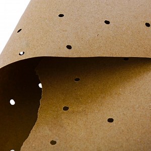 [Hot Item] Recycled Brown Perforated Paper Kraft Paper with Hole for Garments Underlayer