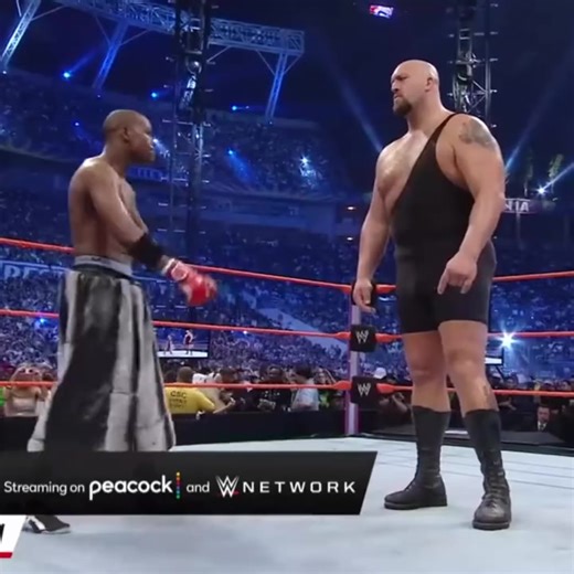 Epic Showdown: Big Show vs. Black Boxer Revealed