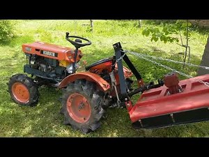 Kubota B6000 with lawnmower