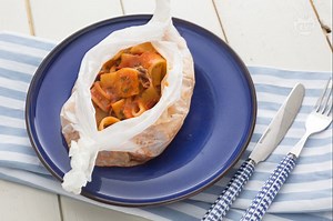 Calamarata (Pasta with calamari and tomato sauce)