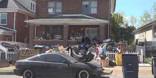 Neighbors say they’ve complained about home overflowing with trash for 2 years: ‘It smells like a giant sock’