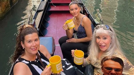 Family Snaps Sunday Mug Shot on Canal Cruise in Venice, Italy
