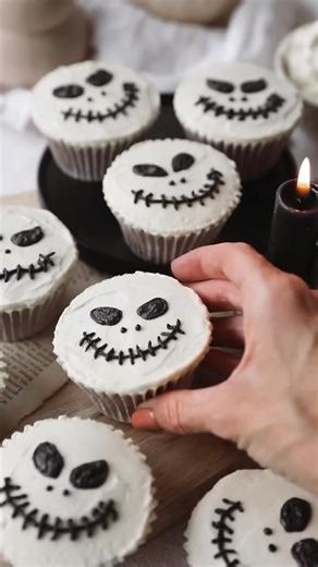 Spooky Season Pending! Save this easy tutorial on how to decorate a Jack Skellington Cupcake! For the cupcakes: 180g unsalted butter at room temperature 180g caster sugar 150g self raising flour 30g cocoa powder, sifted 2 medium eggs For the buttercream: 300g icing sugar, sifted 150g unsalted butter, softened 1 tsp vanilla extract 1-2 tbsp milk Line a cupcake tray with 12 cases and pre heat your oven to 180°c. Using a hand mixer or standing mixer, cream the butter and sugar until light and fluff