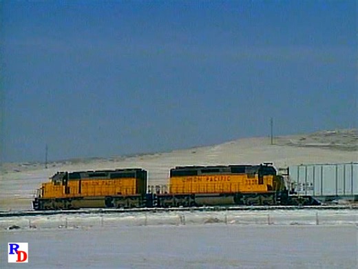 Everything has a blue tint except for the engines on a westbound Union Pacific grain train with helpers, running on a very cold winter day in the early 1990s. (That sick horn is a clue!) From the Pentrex show "Blue Mountains Combo: Volumes 1 2 and 3" https://rfd.video/BlueCombo | Railfan Depot