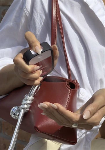 ‘Tis the season of functional bag charms✨ Our Hydrating Hand Sanitizer Mists   Mist cases make for the perfect on-the-go accessory for you, and your bag. #touchland #bagcharm