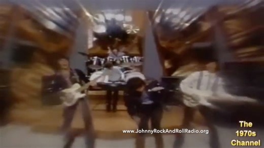 *"Down by the Lazy River"* is a 1972 hit song by **The Osmonds**, released on their album *Phase III*. Written by **Merrill and Donny Osmond**, this energetic track became one of their biggest hits, reaching **#4 on the Billboard Hot 100** and solidifying their status as a major pop and rock group of the early '70s. The song stands out with its **upbeat, rock-driven sound**, a departure from their earlier bubblegum pop style. It features a **catchy chorus, strong harmonies, and a driving beat**,