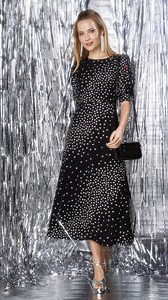 Our stellar star print is out of this world, a figure-loving midi dress to go from desk lunch to dinner plans in. 🌟 | Scamp & Dude