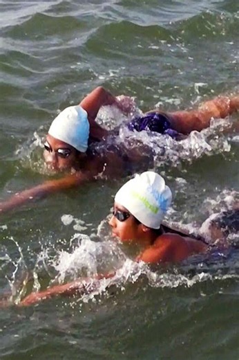 Sisters conquer Alcatraz swim 48 times