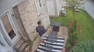 CCTV Footage Shows Man Startled As Groundhog Charges Toward Him