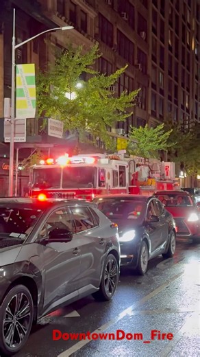 FDNY Engine 34 Tower Ladder 21 responding in heavy traffic