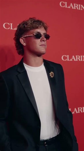 Jaxson Dart off the field, onto the carpet