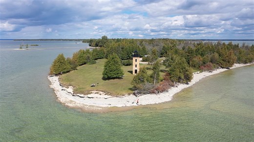 Take in the views from one of Delta County’s most scenic spots — Peninsula Point Lighthouse on the Stonington Peninsula. 🌊🌲 Watch the beauty unfold and see why this historic landmark is a must-visit along the southern shores of Michigan’s Upper Peninsula. Discover Delta County's rich history and coastal charm through its enduring lighthouses: https://visitescanaba.com/things-to-see-and-do/history-and-culture/lighthouses | Visit Escanaba