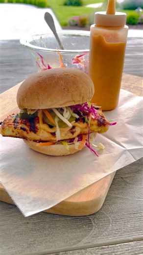 My favorite Grilled Chicken Sandwich, made with tender, pickle-brined grilled chicken breast with a zesty slaw and spicy mayo – so good!! 45g of protein per sandwich! Make it low carb by replacing the buns with a wrap! #grill #chickenrecipes | Skinnytaste